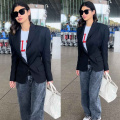 Mouni Roy makes a case for understated elegance in airport fit with black blazer, baggy jeans, and sneakers