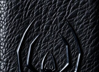 Black Spiderman logo embossed on a black leather texture background.