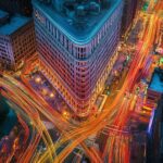 New York Street Wallpaper with the Flatiron Building surrounded by the vibrant energy of the city.