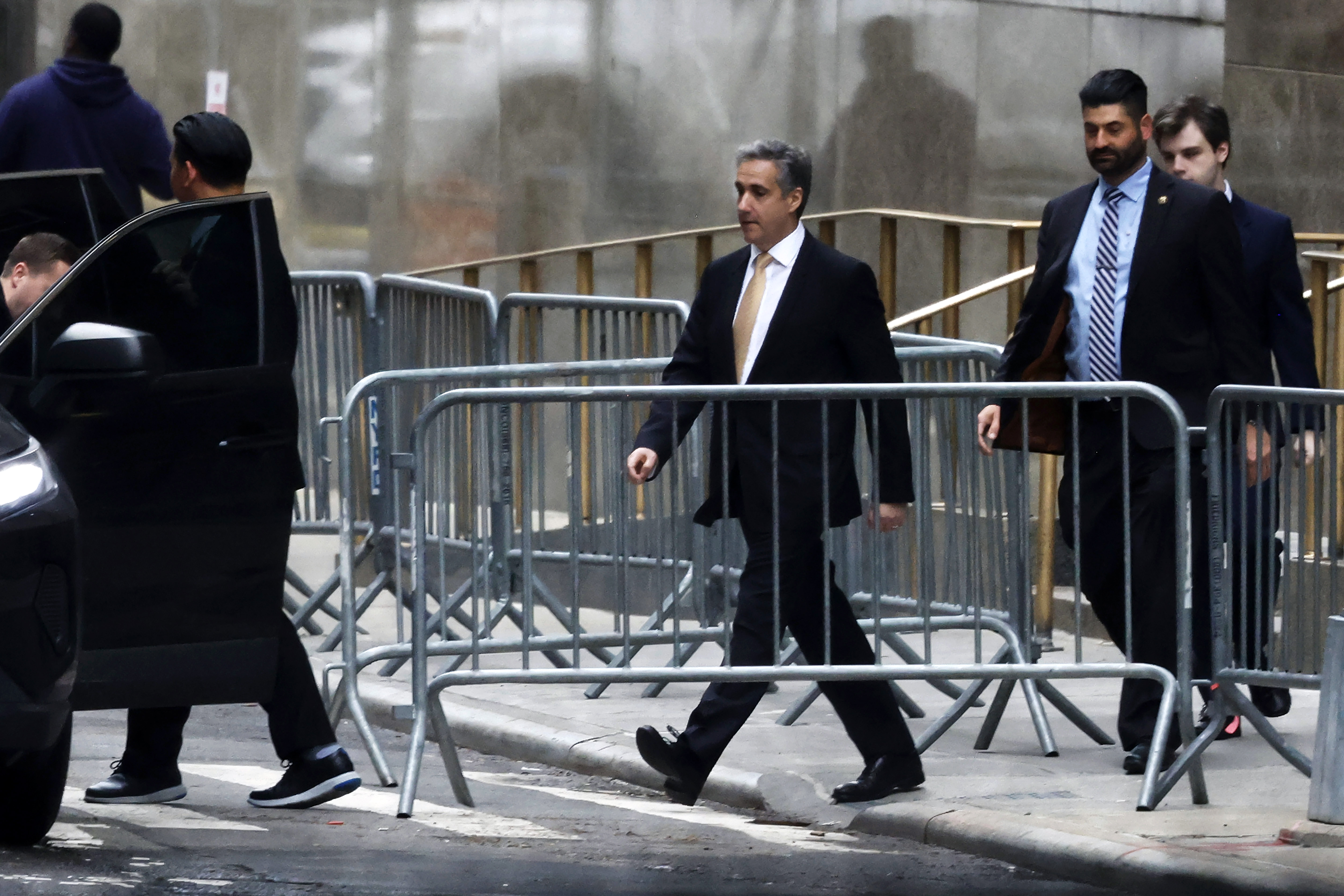 Michael Cohen departs Manhattan Criminal Court.