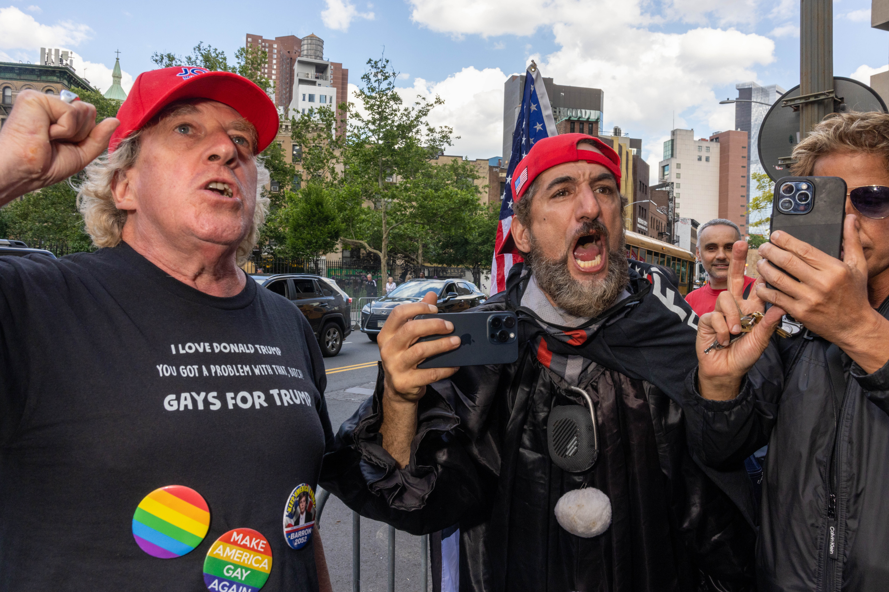 Supporters of former President Donald Trump react outside the Manhattan Criminal Courthouse.