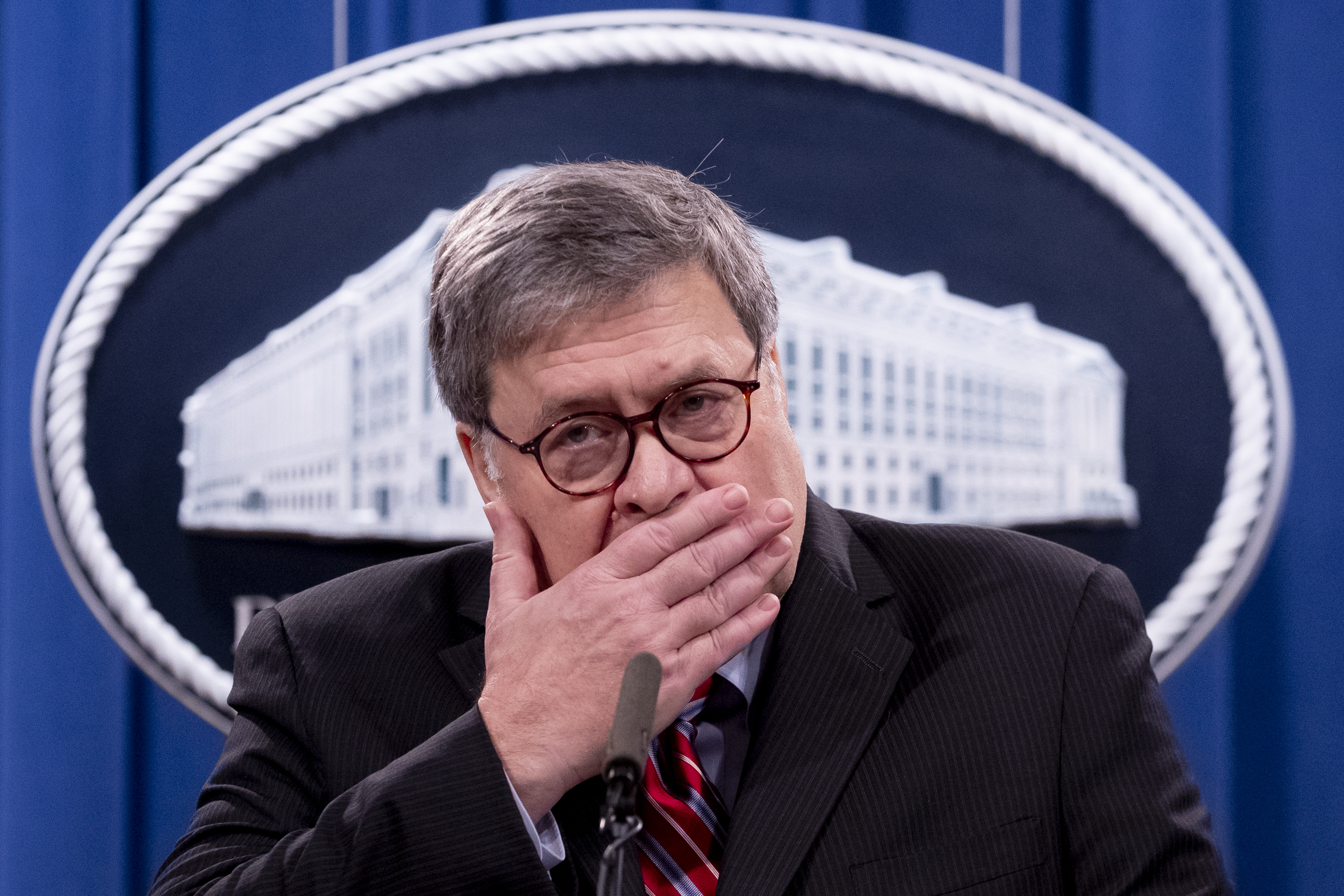 Bill Barr holds a news conference.