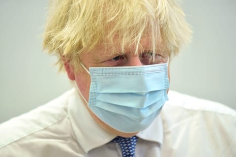 Boris Johnson hit by huge Tory rebellion as coronavirus curbs pass