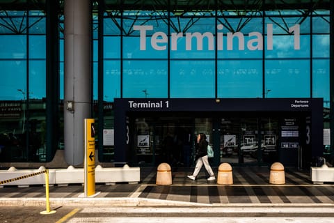 Naked airports for Italians and bins for Americans