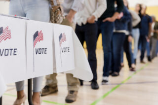 photo - Line of People Waiting To Vote for an Election