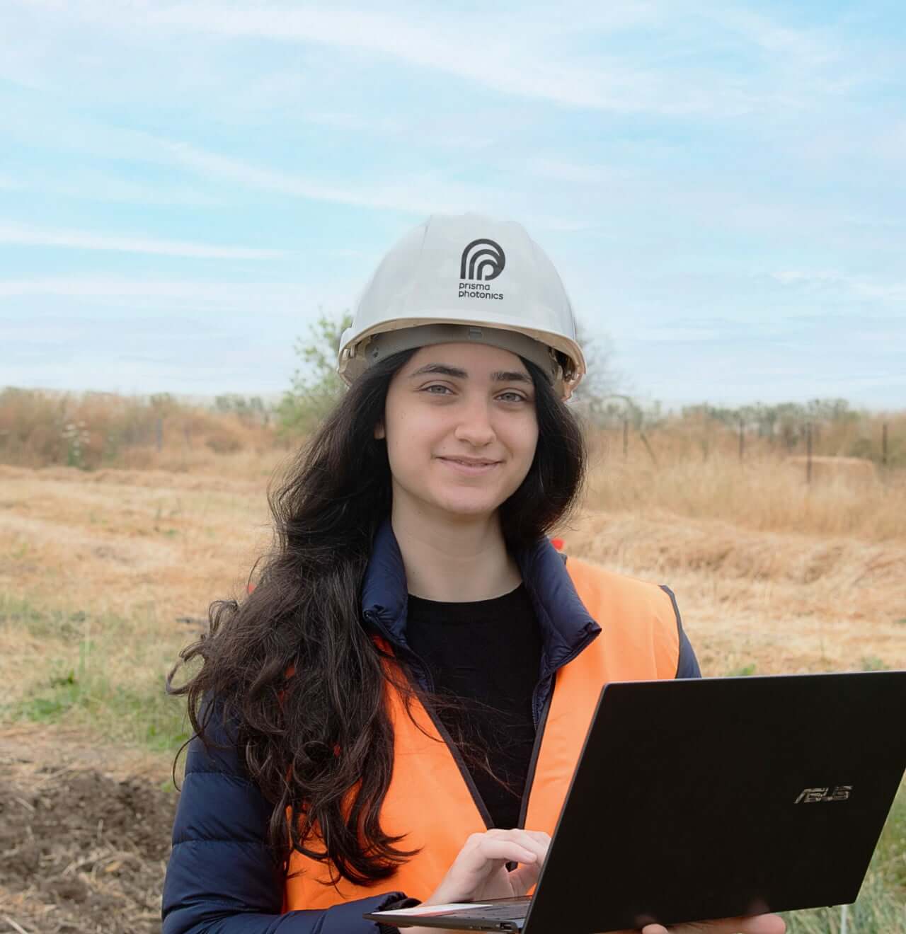 Woman holding a laptop