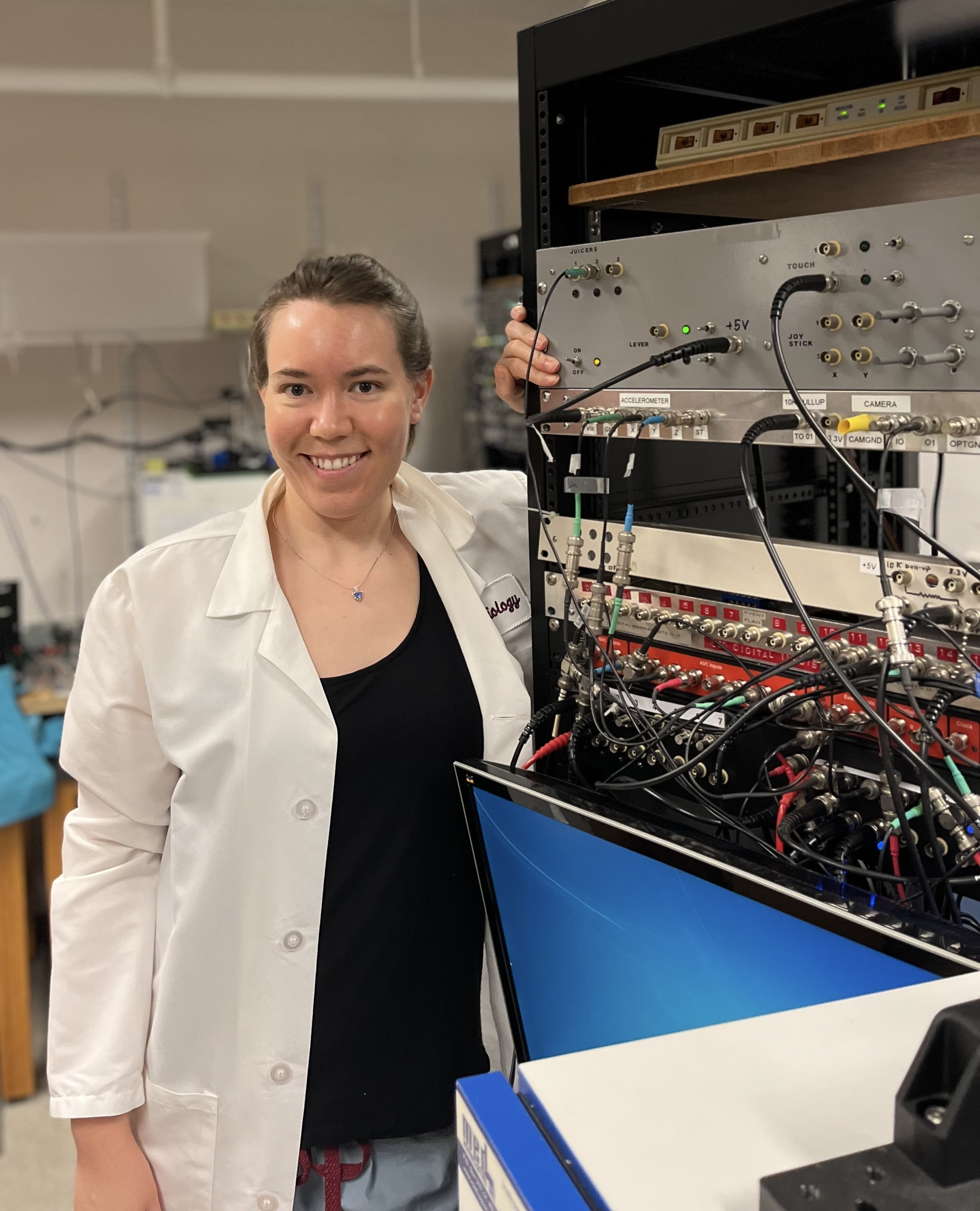 Photo of Allison Hamilos, an M.D.-Ph.D. student at Harvard Medical School, in the laboratory.