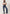 FRONT FULL BODY IMAGE OF MODEL WEARING GETTY WIDE LEG JEANS