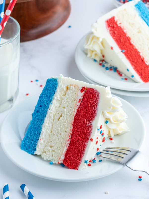 slice of red white and blue cake on plate