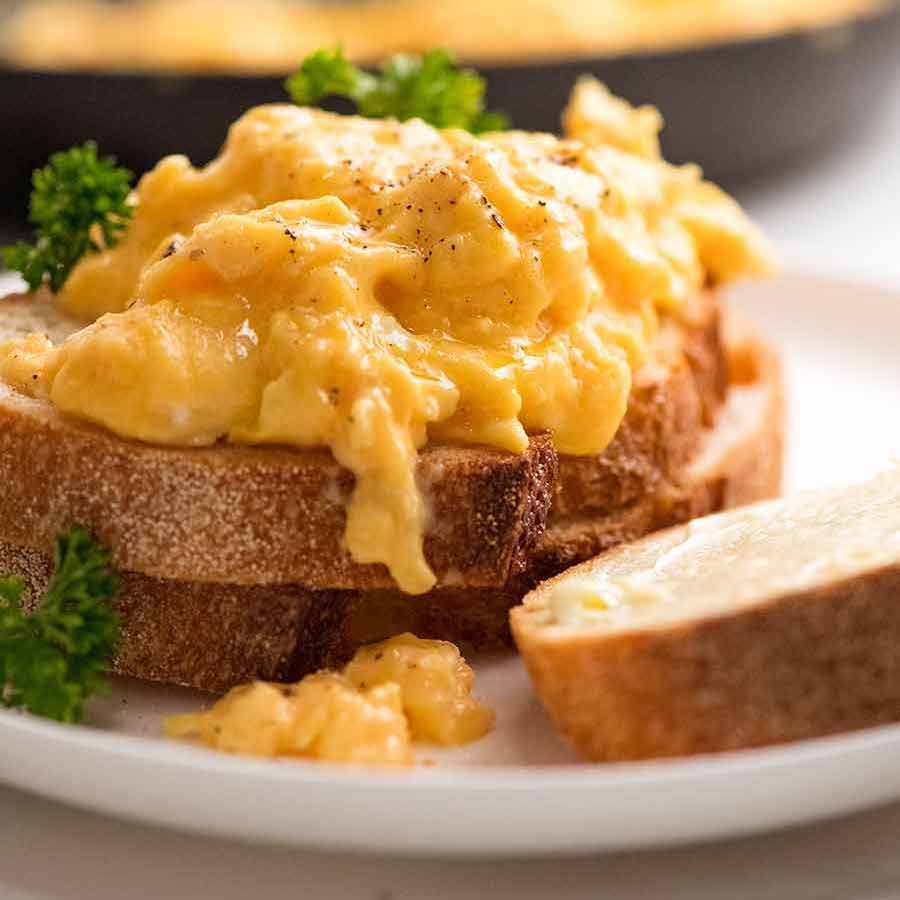 Soft, custardy scrambled eggs piled onto toast