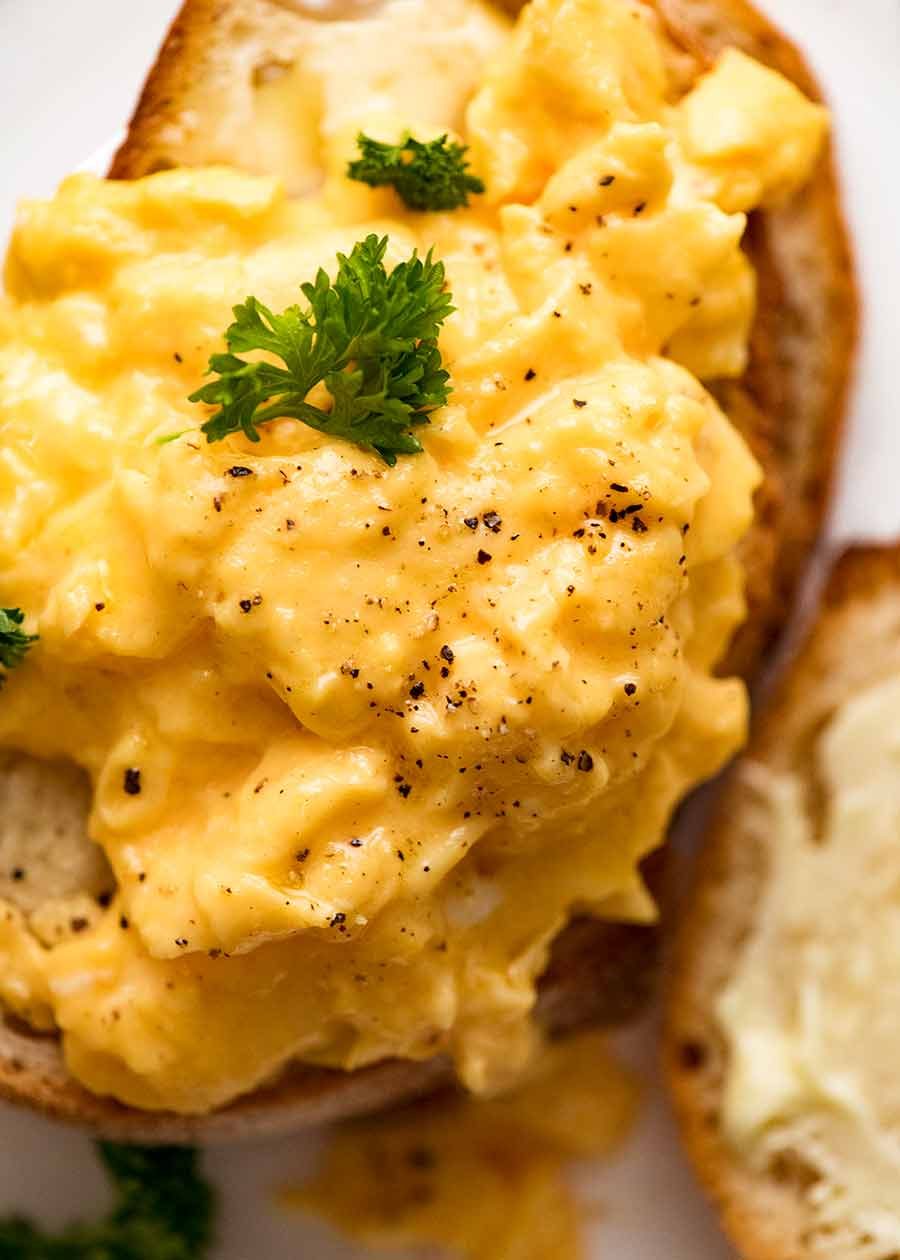 Overhead photo of soft Scrambled Eggs on toast