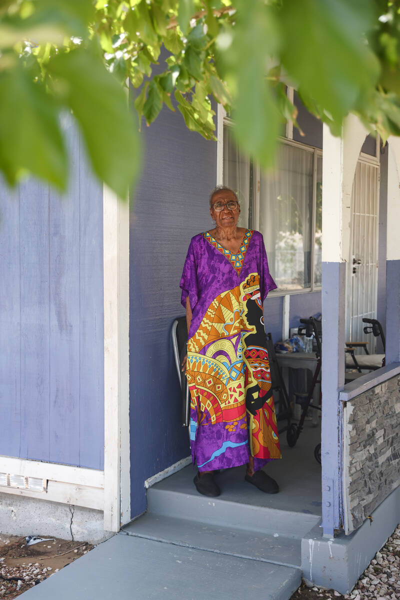 Local resident Annie Walker poses for a portrait on the porch of her home in the Windsor Park n ...