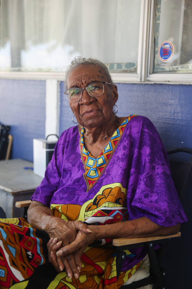 Local resident Annie Walker poses for a portrait on the porch of her home in the Windsor Park n ...