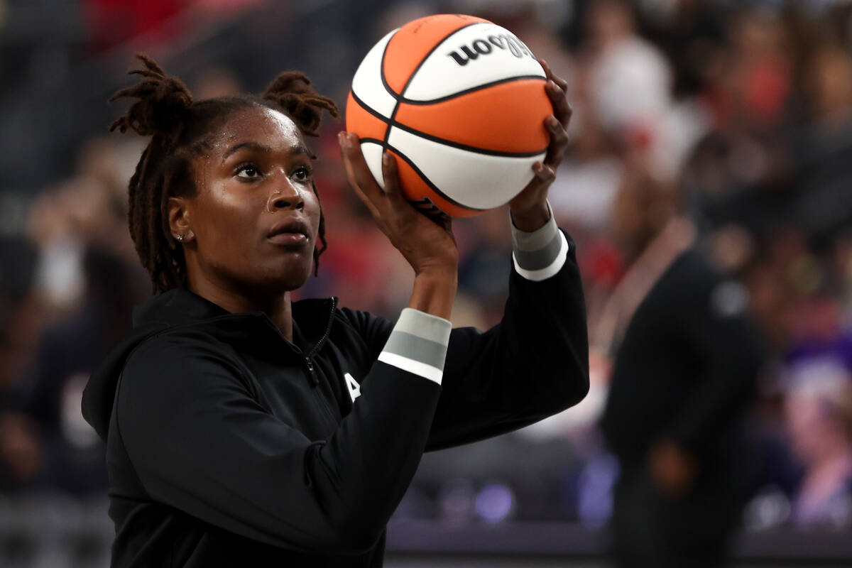 Las Vegas Aces forward Queen Egbo (4) warms up before a WNBA basketball game against the Chicag ...