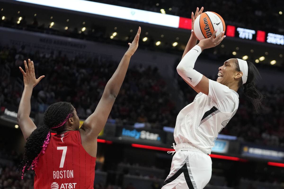 Las Vegas Aces' A'ja Wilson shoots over Indiana Fever's Aliyah Boston (7) during the second hal ...