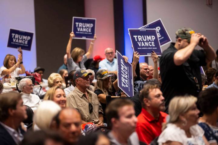 Supporters at a watch party cheer for Republican presidential nominee former President Donald T ...