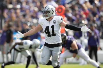 Raiders linebacker Robert Spillane (41) celebrates his interception during the second half of a ...