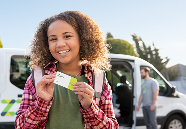 Girl showing ridezum pass