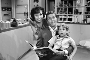 LOS ANGELES - JUNE 19: THE DICK VAN DYKE SHOW episode: "The Meershatz Pipe"   featuring Dick Van Dyke (as Rob Petrie) ; Larry Mathews (as Ritchie Petrie) and Mary Tyler Moore (as Laura Petrie). Image dated June 19, 1961.