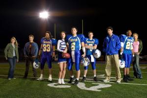 FRIDAY NIGHT LIGHTS -- Pilot -- Pictured: (l-r) Aimee Teegarden as Julie Taylor, Jesse Plemons as Landry Clarke, Taylor Kitsch as Tim Riggins, Minka Kelly as Lyla Garrity, Scott Porter as Jason Street, Zach Gilford as Matt Saracen, Kyle Chandler as Coach Eric Taylor, Gaius Charles as Brian "Smash" Williams, Adrianne Palicki as Tyra Collette  (Photo by Paul Drinkwater/NBCU Photo Bank/NBCUniversal via Getty Images via Getty Images)