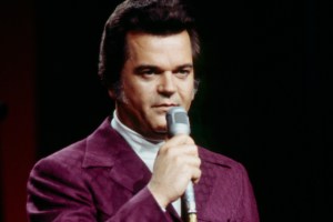 Unspecified - 1974: Conway Twitty performing on the ABC tv special 'The 1974 Country Music Awards'. (Photo by Disney General Entertainment Content via Getty Images)