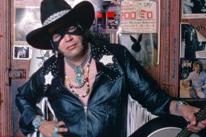 Musician, singer, song writer, entertainer and country music legend, David Allan Coe with guitar dressed as The Mysterious Rhinestone Cowboy for the cover of The New York magazine in August 1975. Photographed waist up at Tootsie's Orchid Lounge, Nashville, Tennessee. Photo is part of the Nashville Music Collection. (Photo by Al Clayton/Getty Images).