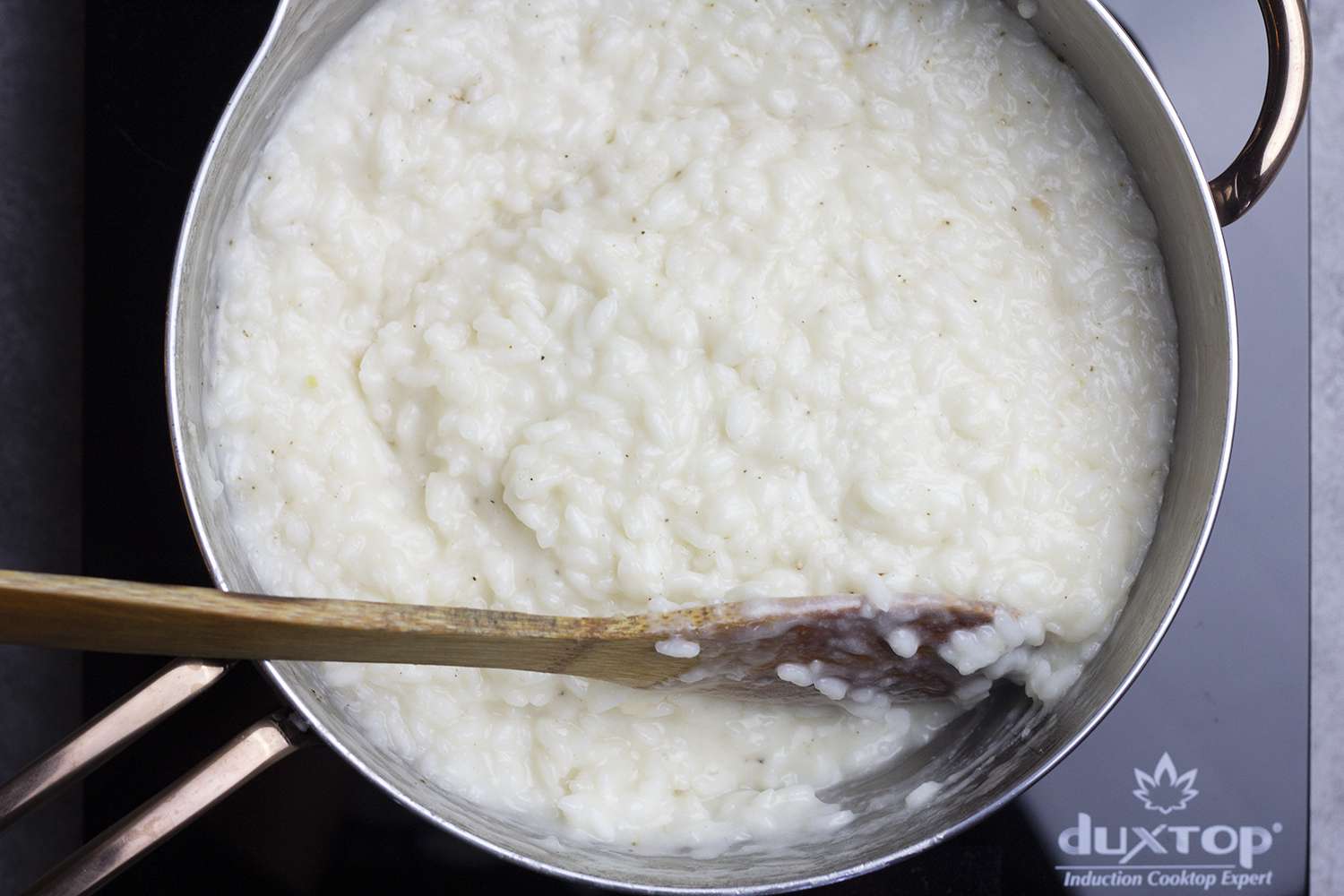 Making risotto in a saucier.