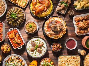 Overhead view of a table full of traditional Ramadan foods.