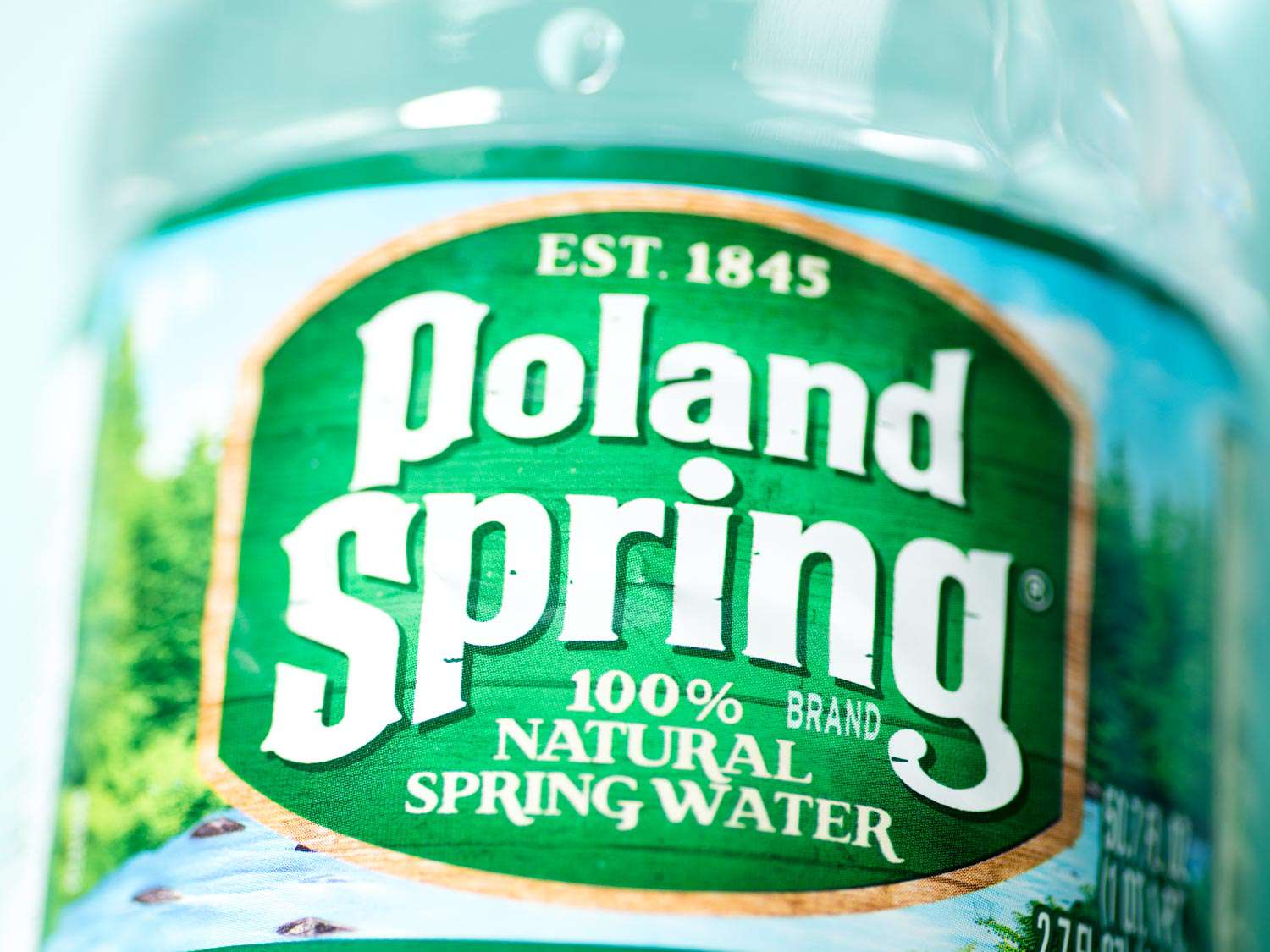 Close-up of a bottle of Poland Spring water.