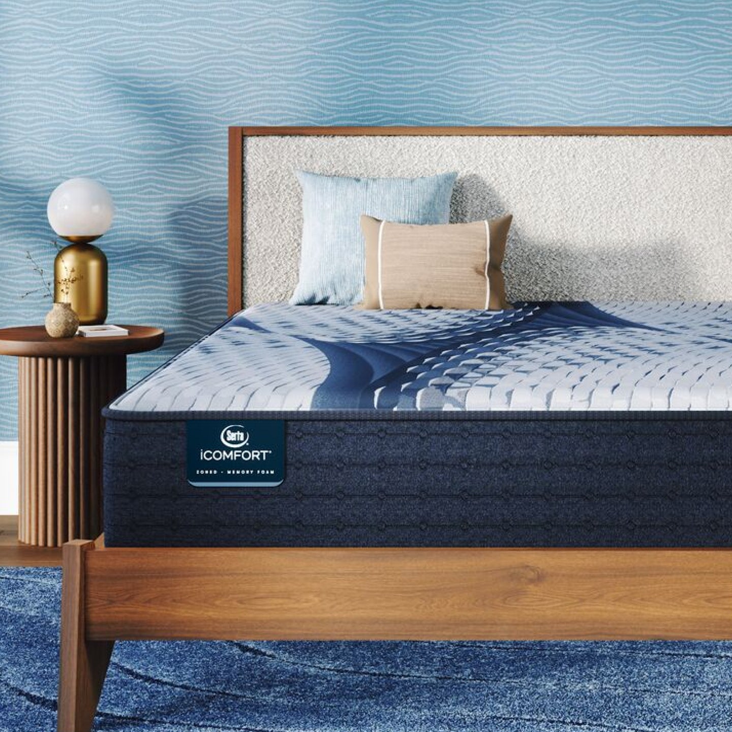 iComfort Aveda Plush Mattress sitting in a brown bedframe || feel: plush || level: Standard - 12"