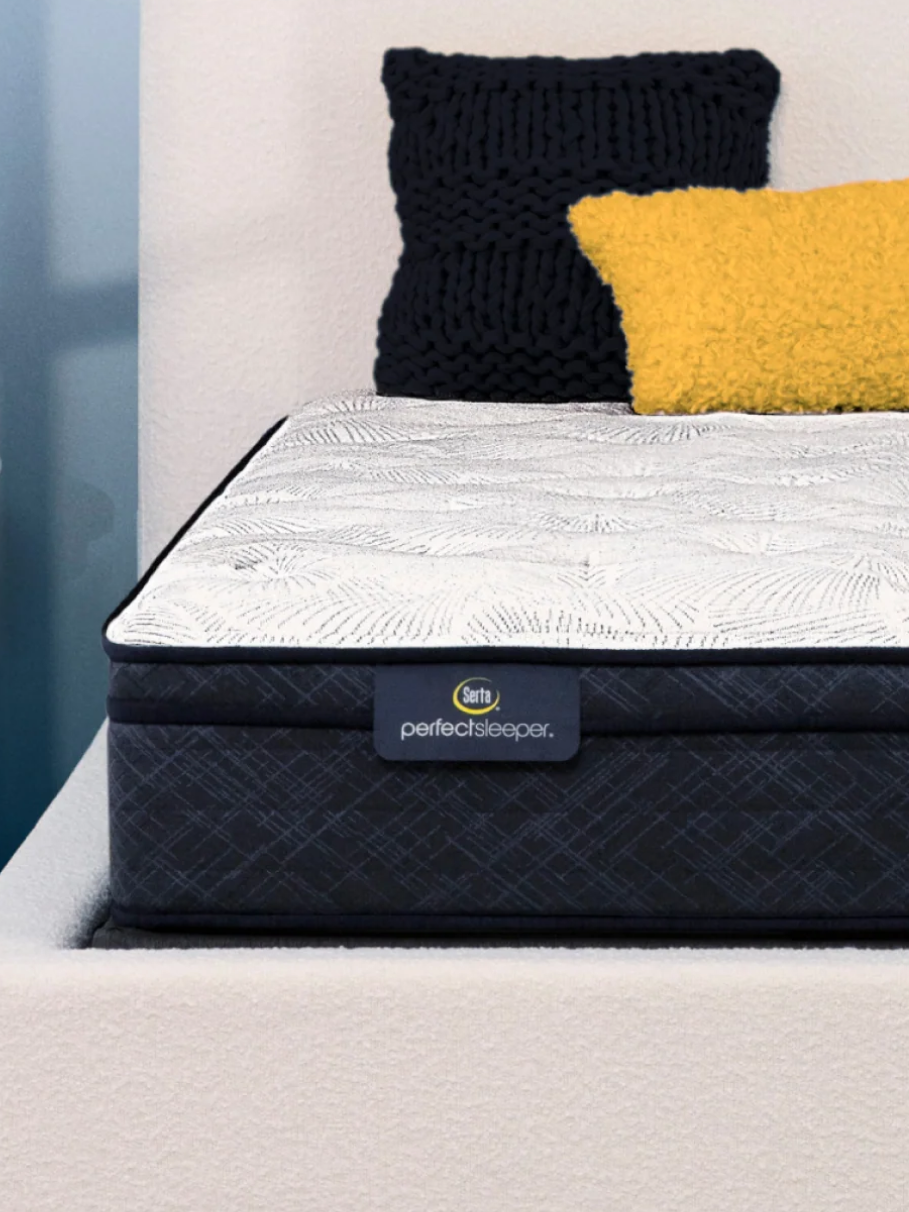 The Serta Perfect Sleeper mattress in a bedroom