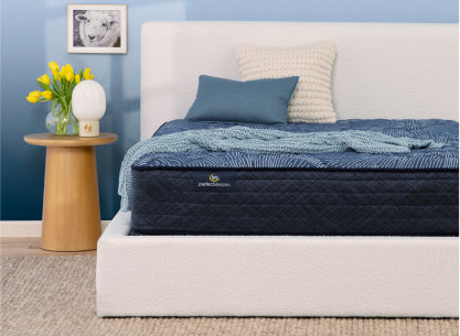 The Serta Perfect Sleeper mattress in a bedroom 