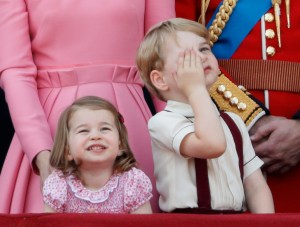 LONDON, UNITED KINGDOM - JUNE 17: (EMBARGOED FOR PUBLICATION IN UK NEWSPAPERS UNTIL 48 HOURS AFTER CREATE DATE AND TIME) Princess Charlotte of Cambridge and Prince George of Cambridge watch the flypast from the balcony of Buckingham Palace during the annual Trooping the Colour Parade on June 17, 2017 in London, England. Trooping the Colour is a military parade to mark Queen Elizabeth II's official birthday and dates back to the time of Charles II in the 17th Century when the Colours of a Regiment were used as a rallying point in battle. (Photo by Max Mumby/Indigo/Getty Images)