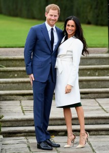 LONDON, ENGLAND - NOVEMBER 27:  Prince Harry (L) and Meghan Markle during an official photocall to announce the engagement of Prince Harry and actress Meghan Markle at The Sunken Gardens at Kensington Palace on November 27, 2017 in London, England.  Prince Harry and Meghan Markle have been a couple officially since November 2016 and are due to marry in Spring 2018.  (Photo by Samir Hussein/Samir Hussein/WireImage)