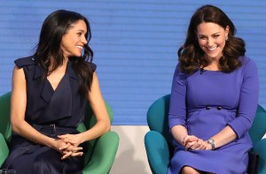 TOPSHOT - US actress and fiancee of Britain's Prince Harry Meghan Markle (L) and Britain's Catherine, Duchess of Cambridge attend the first annual Royal Foundation Forum on February 28, 2018 in London. (Photo by Chris Jackson / POOL / AFP) (Photo by CHRIS JACKSON/POOL/AFP via Getty Images)