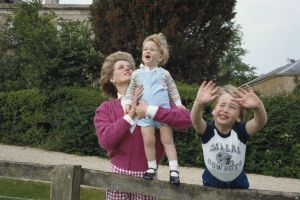 Princes William and Harry with their mother, Diana, Princess of Wales (1961 - 1997) in the garden of Highgrove House in Gloucestershire, 18th July 1986. William is wearing a Dallas Cowboys t-shirt.(Photo by Tim Graham Photo Library via Getty Images)