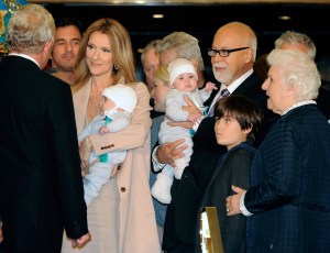 LAS VEGAS, NV - FEBRUARY 16:  (L-R) Singer Celine Dion, holding her son Nelson Angelil, her husband and manager Rene Angelil, holding their son Eddy Angelil, their son Rene-Charles Angelil and Dion's mother Therese Dion are greeted as they arrive at Caesars Palace February 16, 2011 in Las Vegas, Nevada. Celine Dion will begin rehearsals for her new show set to debut March 15 at The Colosseum at Caesars Palace.  (Photo by Ethan Miller/Getty Images)