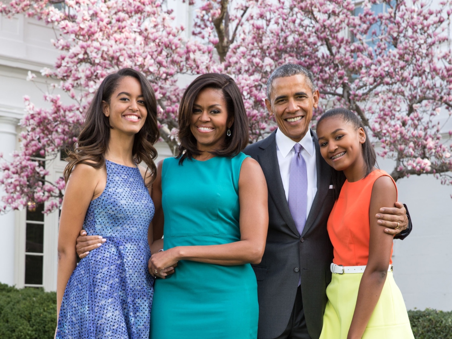 Obama Family photo in the White House Rose Garden, Easter Sunday, April 5, 2015. L-R: Malia, First Lady Michelle, the President, and Sasha with dogs Sunny and Bo. (BSLOC_2015_13_139). For Editorial Use Only