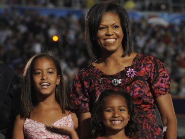 Democratic Presidential candidate Barack Obama (C), wife Michelle (R) daughters MAlia (C-R) and Sasha (R), and Vice Presidential candidate Joe Biden and wife Jill appear on stage at the end of the Democratic National Convention 2008 at the Invesco Field in Denver, Colorado, on August 28, 2008. The Illinois senator tonight formally accepted his nomination as the first African-American from a major party to run for the White House before more than70,000 people.