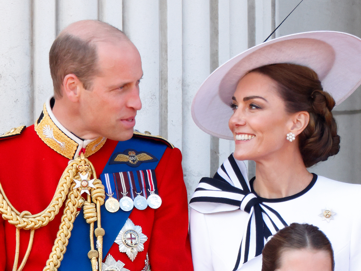 Prince William, Prince of Wales (Colonel of the Welsh Guards) and Catherine, Princess of Wales watch an RAF flypast from the balcony of Buckingham Palace after attending Trooping the Colour on June 15, 2024 in London, England. Trooping the Colour, also known as The King's Birthday Parade, is a military ceremony to mark the official birthday of the British Sovereign. The ceremony takes place at Horse Guards Parade followed by a flypast over Buckingham Palace and was first performed in the mid-17th century during the reign of King Charles II. The parade features all seven regiments of the Household Division with Number 9 Company, Irish Guards being the regiment this year having their Colour Trooped.