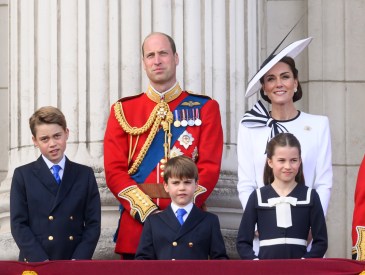 LONDON, ENGLAND - JUNE 15: Prince George of Wales, Prince William, Prince of Wales, Prince Louis of Wales, Princess Charlotte of Wales and Catherine, Princess of Wales on the balcony of Buckingham Palace during Trooping the Colour on June 15, 2024 in London, England. Trooping the Colour is a ceremonial parade celebrating the official birthday of the British Monarch. The event features over 1,400 soldiers and officers, accompanied by 200 horses. More than 400 musicians from ten different bands and Corps of Drums march and perform in perfect harmony. (Photo by Karwai Tang/WireImage)