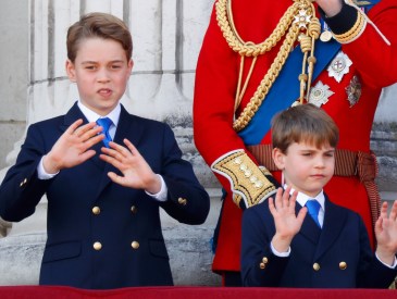 LONDON, UNITED KINGDOM - JUNE 15: (EMBARGOED FOR PUBLICATION IN UK NEWSPAPERS UNTIL 24 HOURS AFTER CREATE DATE AND TIME) Prince George of Wales and Prince Louis of Wales watch an RAF flypast from the balcony of Buckingham Palace after attending Trooping the Colour on June 15, 2024 in London, England. Trooping the Colour, also known as The King's Birthday Parade, is a military ceremony to mark the official birthday of the British Sovereign. The ceremony takes place at Horse Guards Parade followed by a flypast over Buckingham Palace and was first performed in the mid-17th century during the reign of King Charles II. The parade features all seven regiments of the Household Division with Number 9 Company, Irish Guards being the regiment this year having their Colour Trooped.