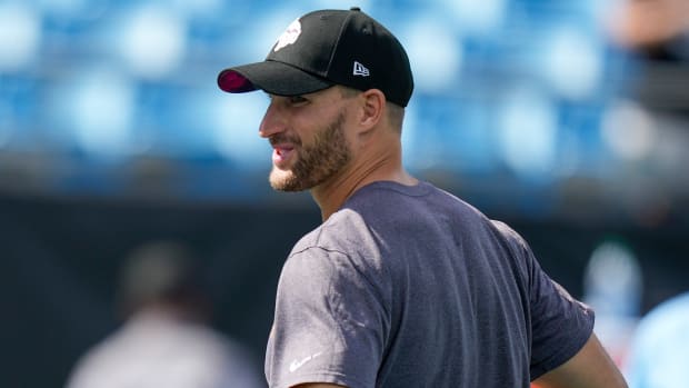 QB Kirk Cousins looks on during a practice