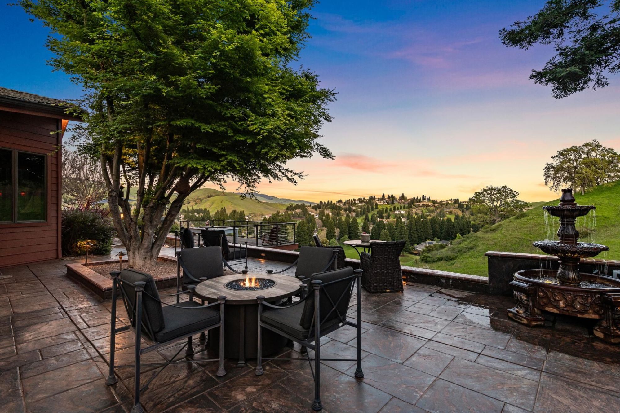 Outdoor firepit overlooking golf course.