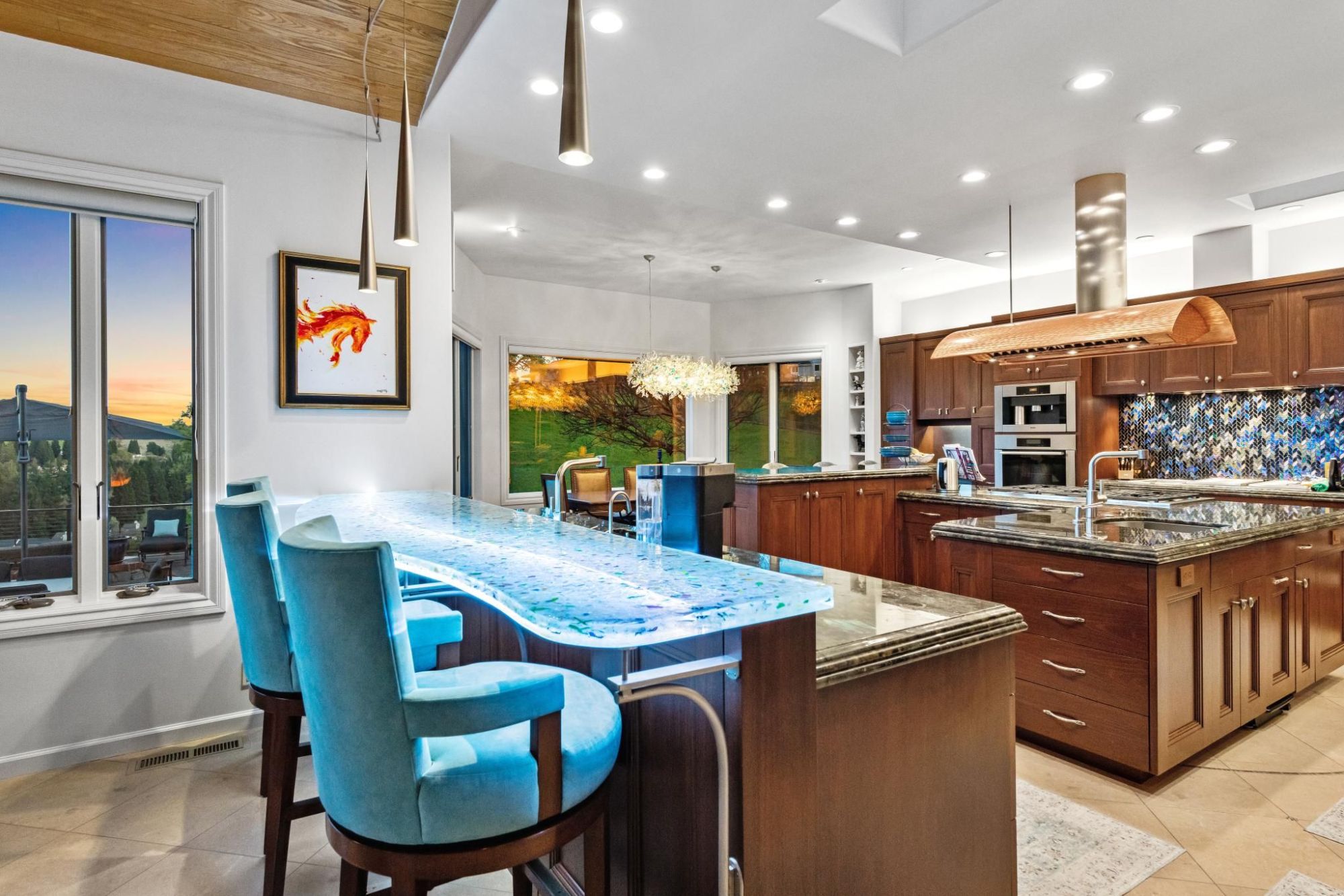 Chef's kitchen with translucent bar top.