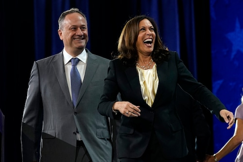 Democratic vice presidential candidate Sen. Kamala Harris, D-Calif., and her husband Doug Emhoff smile during the fourth day of the Democratic National Convention, Thursday, Aug. 20, 2020, at the Chase Center in Wilmington, Delaware