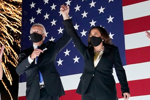 Democratic presidential candidate former Vice President Joe Biden and his running mate Sen. Kamala Harris, D-Calif., watch fireworks during the fourth day of the Democratic National Convention, Thursday, Aug. 20, 2020, at the Chase Center in Wilmington, Delaware