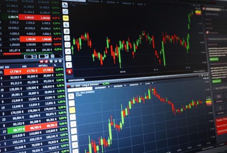 a computer screen showcasing stock market data, highlighting key metrics for an options trading course