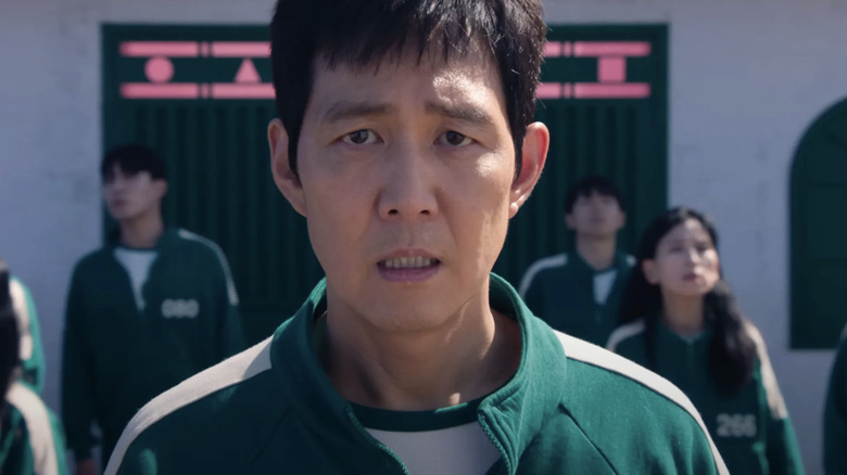 Lee Jung-jae as Seong Gi-hun facing the camera in Squid Game