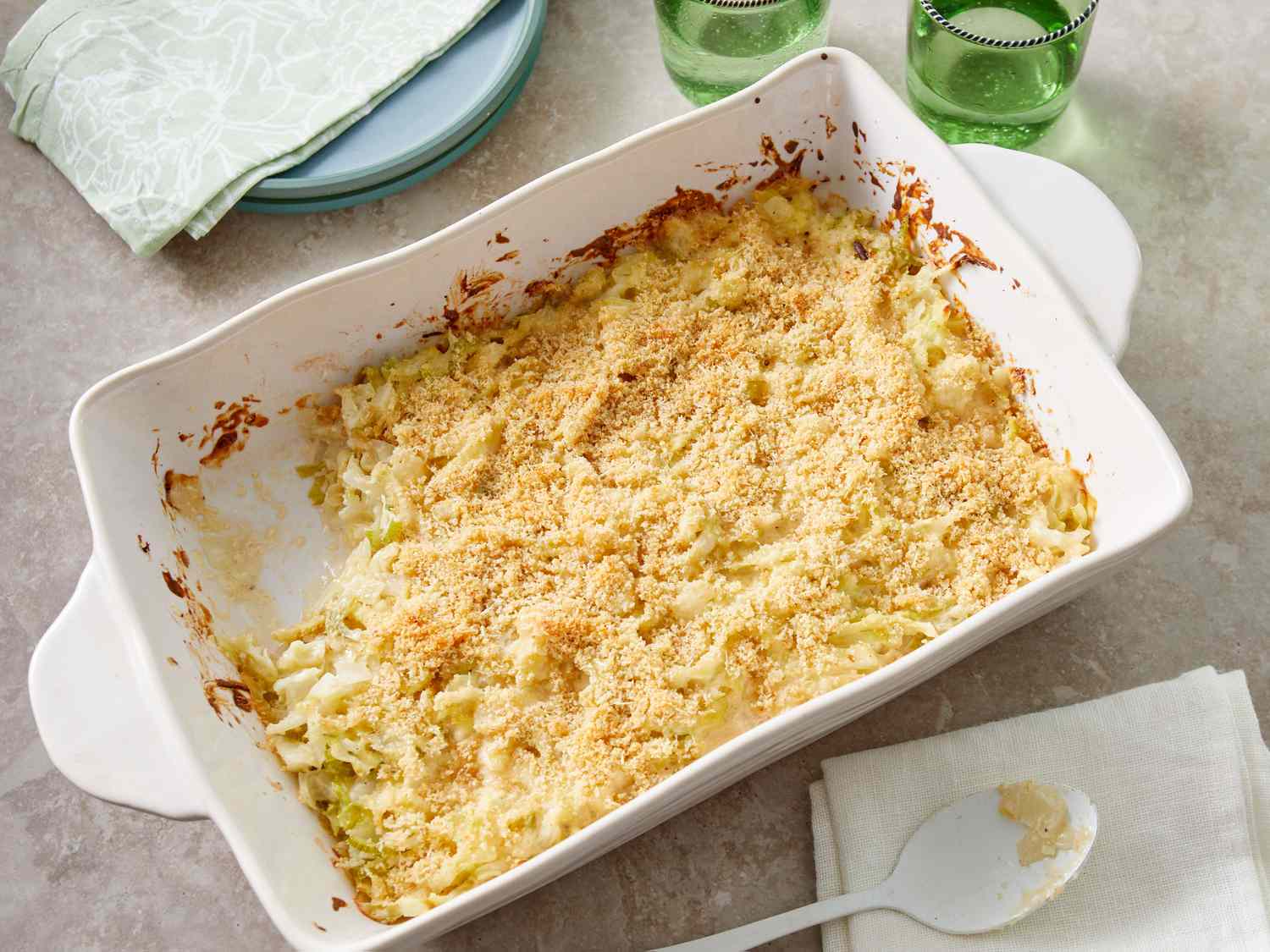 Southern Living Cabbage Casserole in the dish to serve with a serving scooped out